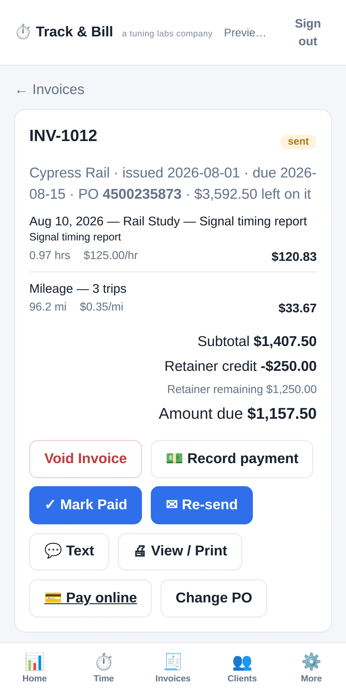 Track & Bill invoice detail with purchase order, status, and payment recording