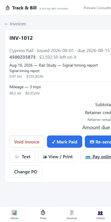 A printed Track & Bill invoice showing the company header, bill-to block and itemized line items.